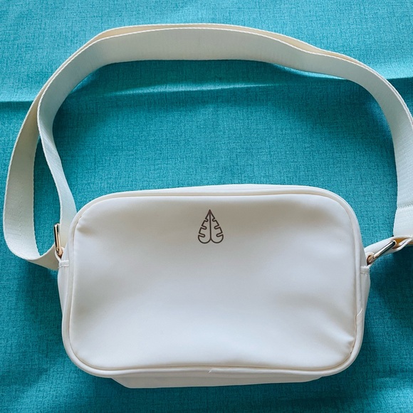 Biossance Handbags - Biossance crossbody cosmetic bag
